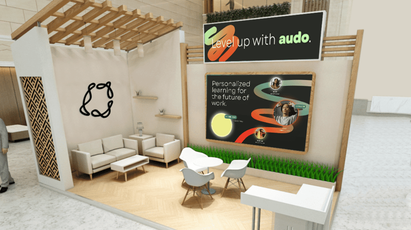 A display room with some Audo graphics written on a board. 