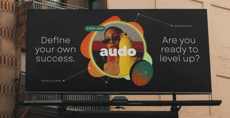 Billboard with Audo marketing materials. It shows a new user profile with text that reads 