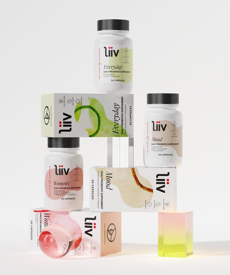 Liiv probiotic supplement bottles stacked on top of each other.